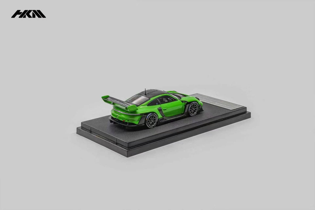 HKM Porsche 911 (992) GT3 R Rennsport in Viper Green — rear view