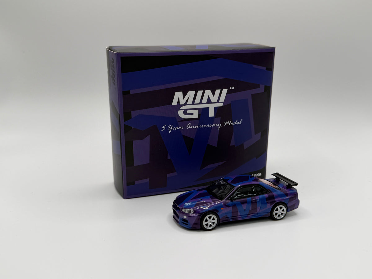 Mini GT #446 Nissan Skyline GTR R34 Digital Camouflage Purple