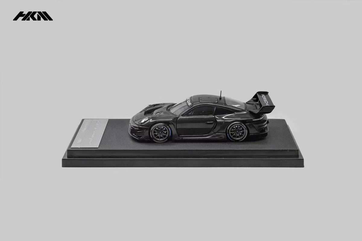HKM Porsche 911 (992) GT3 R Rennsport in Gloss Black — side view