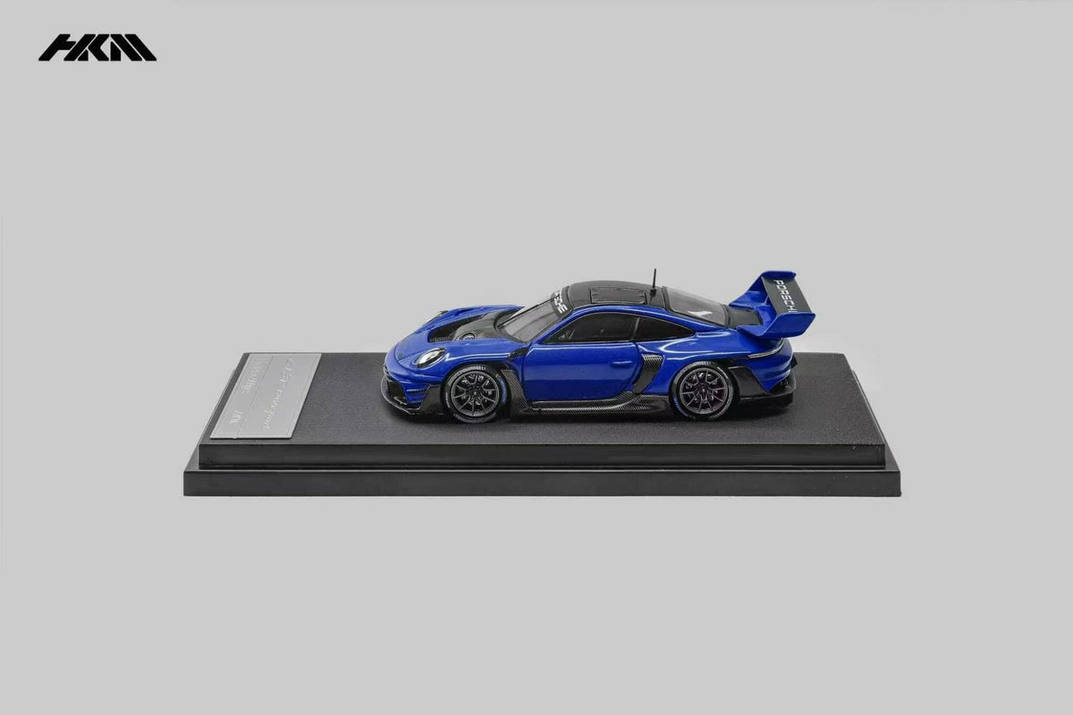HKM Porsche 911 (992) GT3 R Rennsport in Sanmarino Blue Metallic — side view