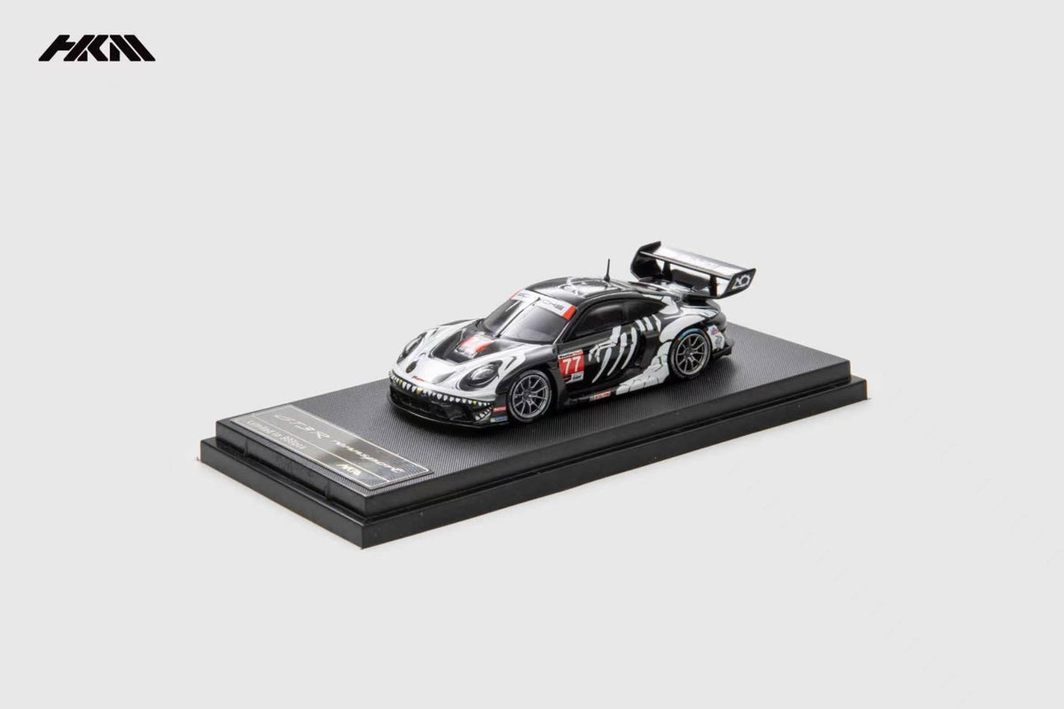 HKM Porsche 911 (992) GT3 R Rennsport in Skeleton Dinosaur Livery — front view