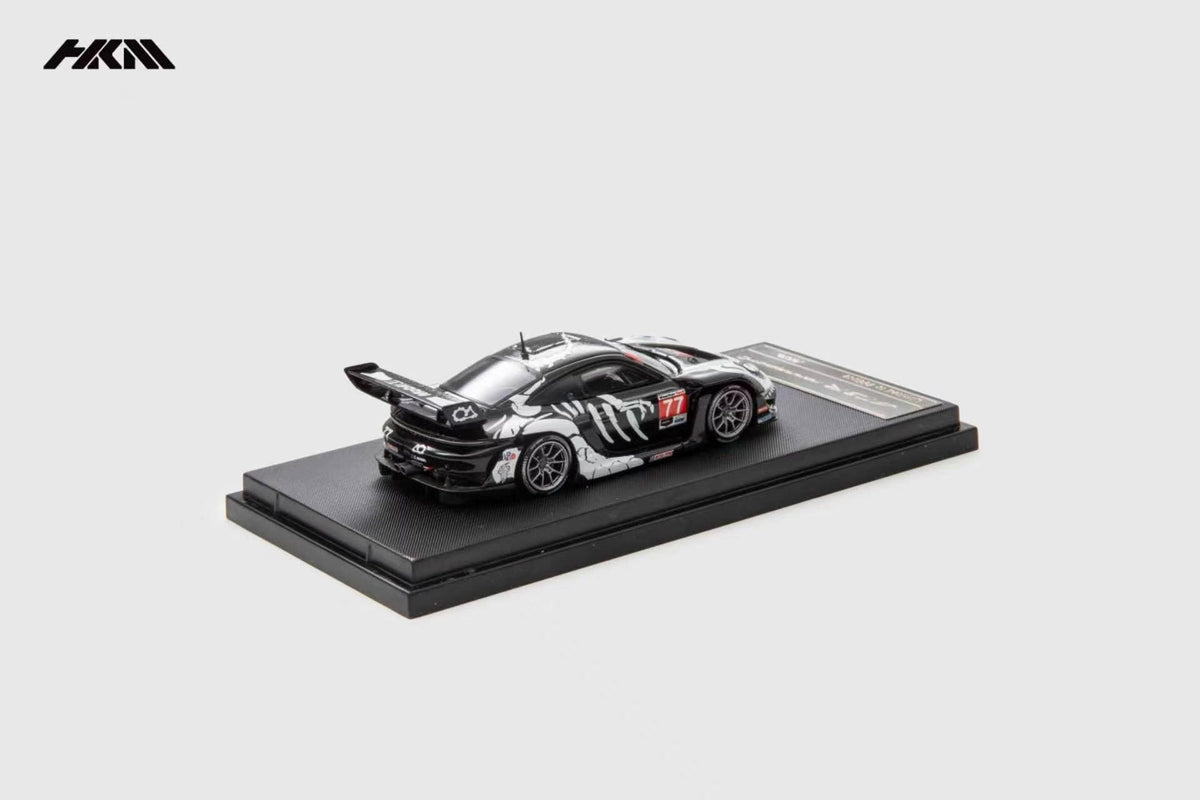 HKM Porsche 911 (992) GT3 R Rennsport in Skeleton Dinosaur Livery — rear view