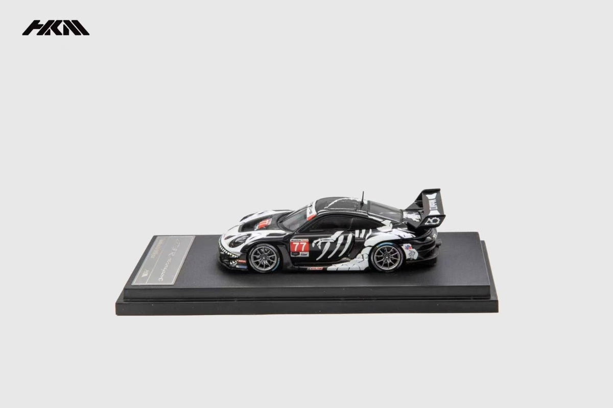 HKM Porsche 911 (992) GT3 R Rennsport in Skeleton Dinosaur Livery — side view
