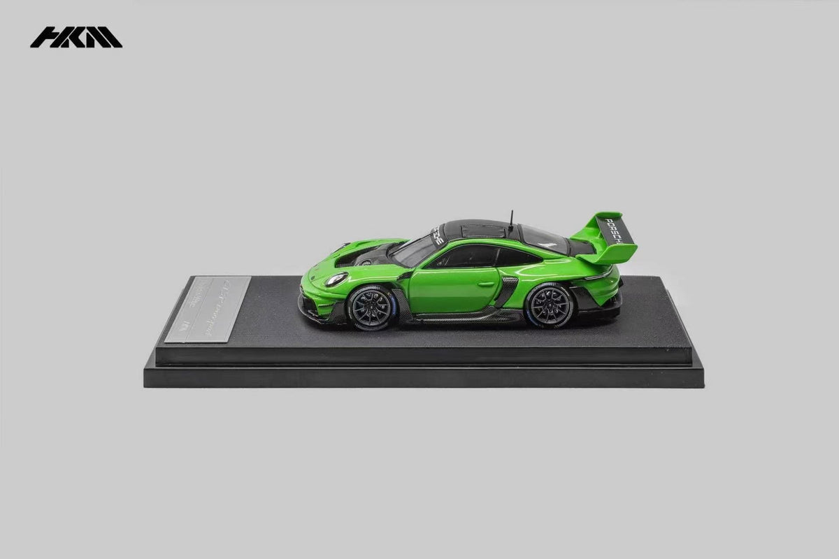 HKM Porsche 911 (992) GT3 R Rennsport in Viper Green — side view